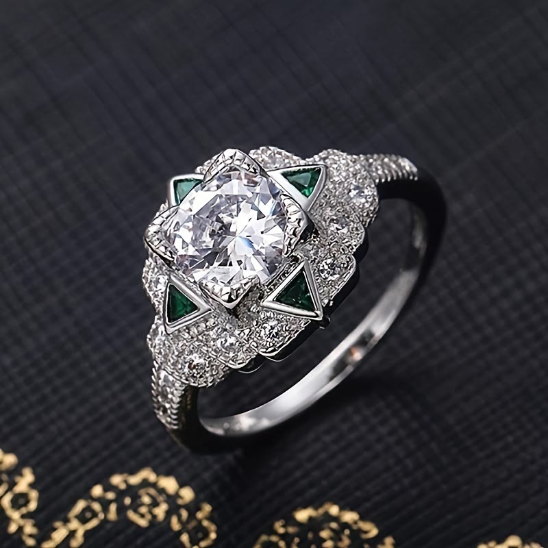 "Emerald Isle" Vintage Cubic Zircon Triangle Emerald Engagement Ring